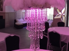 Waterfall chandeliers with feathers and floral ring