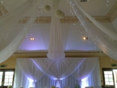 Grecian-backdrop-with-ceiling-drapes
