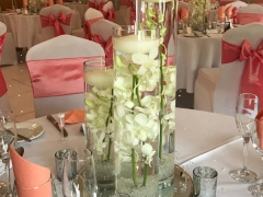 trio of singapore orchids with large floating candle tops